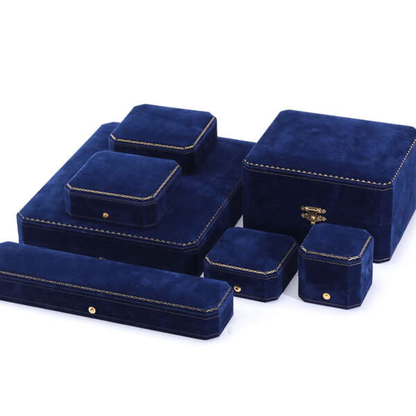 Open dark jewelry box showing soft interior layout