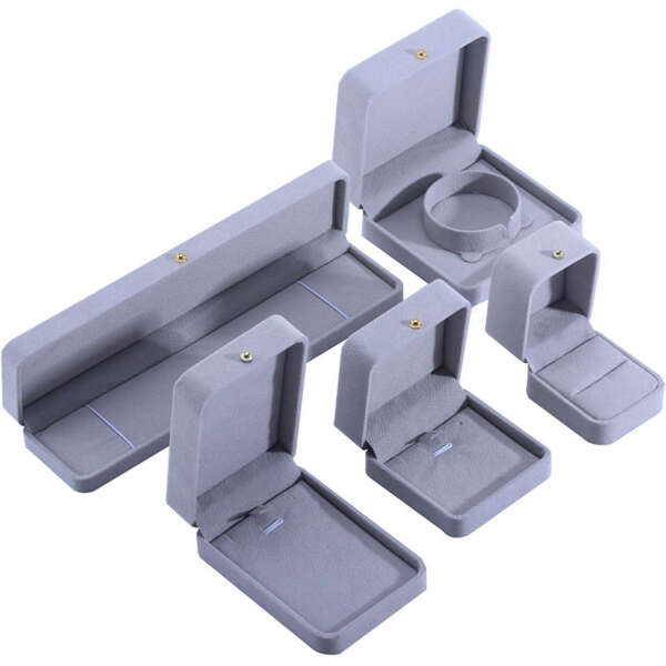 Open luxury jewelry box showing soft multi piece layout