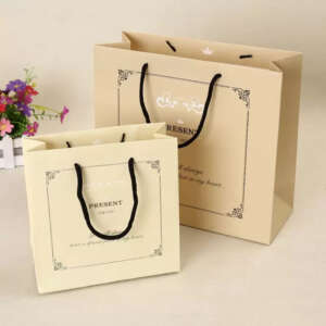 Wholesale Custom Reusable Eco Friendly Logo Embossed Gift Bags Bulk Retail Boutique Gift Packaging Shopping Paper Bag